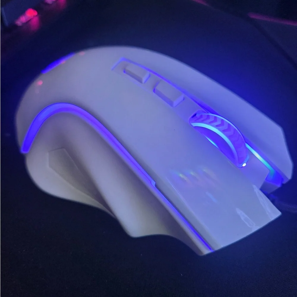 Hardly used all white red dragon mouse. Multi colors with 6ft cord